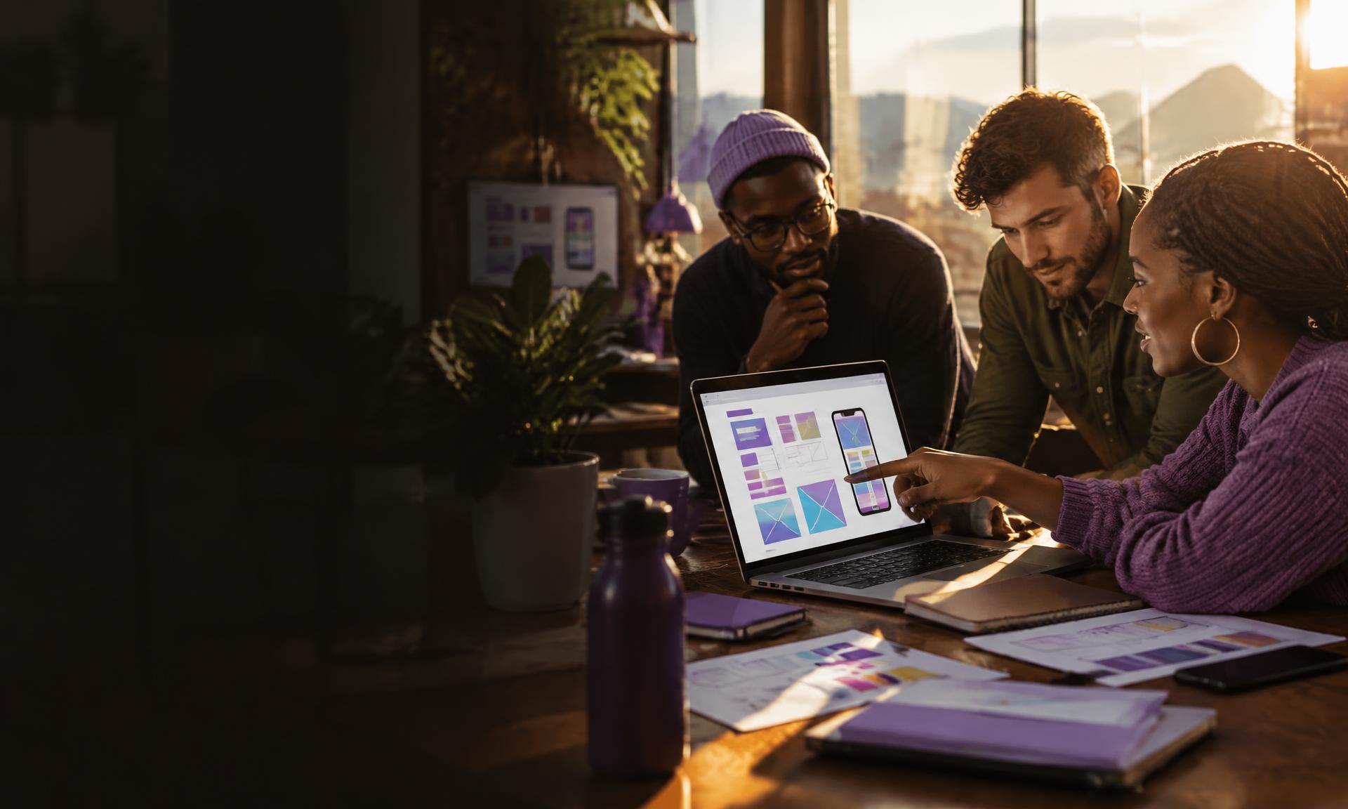 Digital specialists collaborating on a website